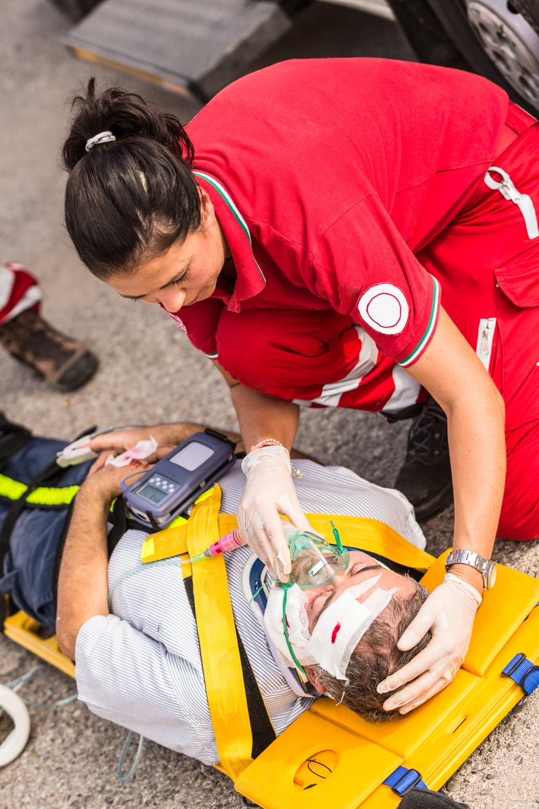 A picture of a rescue team providing first aid